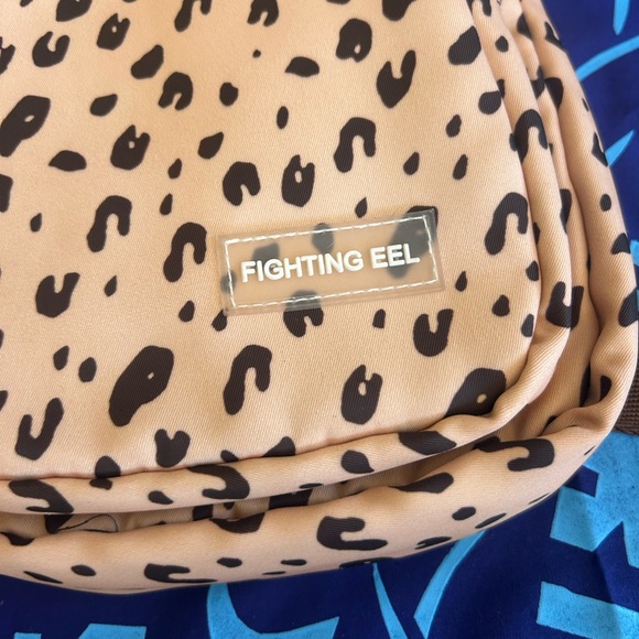 Fighting Eel Tan and Black Patterned Crossbody Bag - Picture 2 of 12